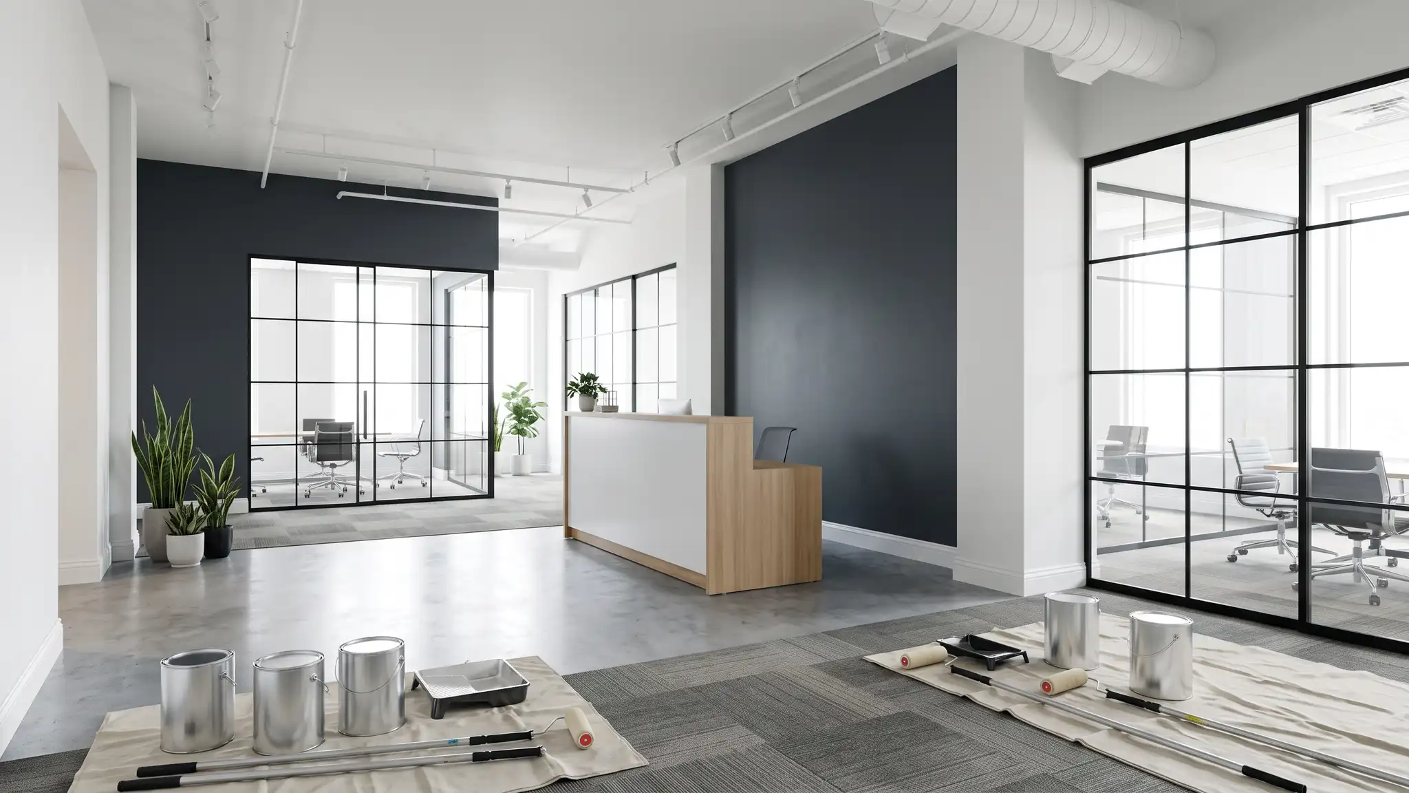 Commercial and Property Painting | Music City Paint and Drywall A modern commercial office with polished concrete floors, dark gray accent walls and glass partitions